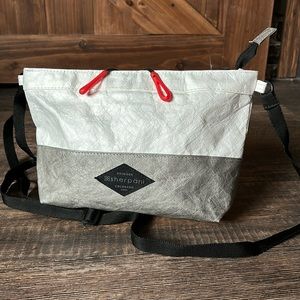 Sherpani White and Gray Crossbody Bag with Red Accents